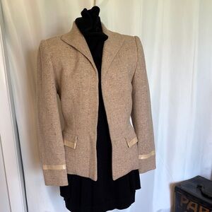 Woven Linen blazer with leather accents lined with animal print hidden buttons